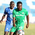 Gor Mahia forward Benson Omalla (right) controls the ball under pressure Nairobi City Stars defender Rowland Makati 