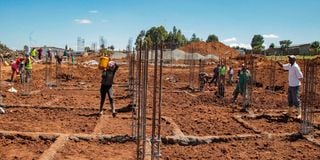 Workers at an affordable housing site