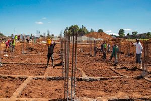 Workers at an affordable housing site