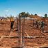 Workers at an affordable housing site