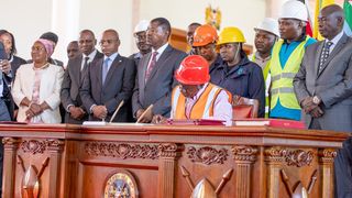 President William Ruto assents to the Affordable Housing Bill at State House, Nairobi on Tuesday.