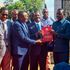 Raila Odinga holds a copy of a copy of Nadco report 