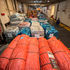 Humanitarian aid and food supplies for Gaza are seen inside a cargo ship, at the port of Misrata