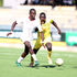 Rainbow FC's Ogam Ryan vies with SS Assad's Harun Junior