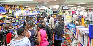 Parents and guardians shop for textbooks 