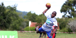 Sheldon Adaka of Hospital Hill High School vies with Abdi Hafit of Sabunley High School