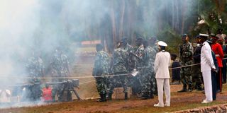 Kenyan military gives a gun salute in a past event.