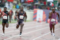 Kenya's Ferdinand Omanyala (centre) takes on USA's Kenny Bednarek 