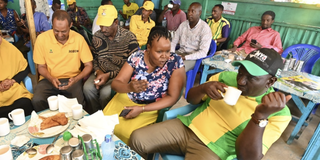 President William Ruto takes breakfast at a kibanda in Mandera Town.