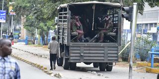 Anti-Riot police officers parked along Kenyatta Avenue