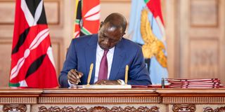 President William Ruto signs the Supplementary Appropriation Bill, 2024, into la