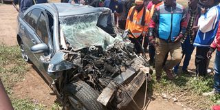 wreckage of car involved in accident with lorry in Mbaruk