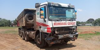 wreckage of car involved in accident with lorry in Mbaruk