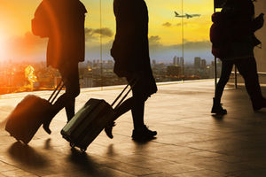 travellers airport suitcases