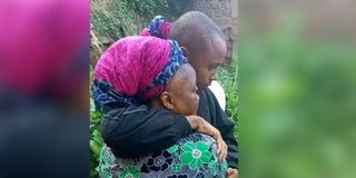 Billy Munyiri Mwangi hugs his mother Regina Wairimu