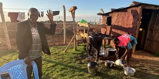 Samson Cheruiyot, father to the late Kelvin Kiptum, outside their makeshift kitchen
