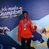 Kenya's Stency Neema poses after winning gold