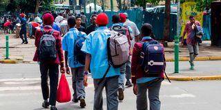 High school students walk home