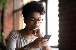 woman reading phone