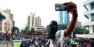 Protestor with phone