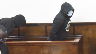 Police officers Godwine Sirengo Wekesa (right) and Emmanuel Wafula Viambaka