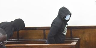 Police officers Godwine Sirengo Wekesa (right) and Emmanuel Wafula Viambaka