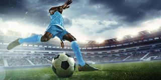 man playing soccer player