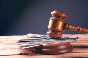 Gavel and money in court.