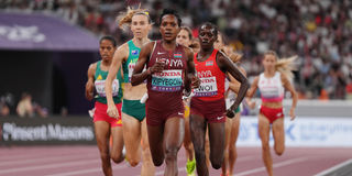 Faith Kipyegon and Dorcus Ewoi