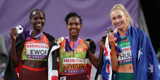 Faith Kipyegon and Dorcus Ewoi