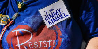 2025-09-22T191506Z_1136455648_RC26XGALQ7SF_RTRMADP_3_USA-KIMMEL-UNION-RALLY