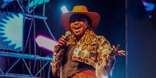 Muthoni the Drummer Queen blankets and wine