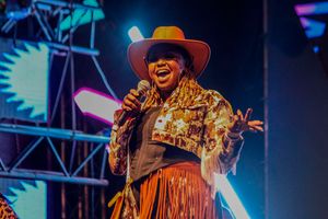 Muthoni the Drummer Queen blankets and wine