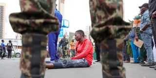 Raila Odinga's supporters mourn him outside Parliament