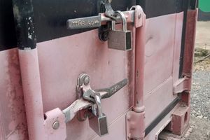 The special digital padlock is seen on a Knec container