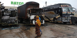 wreckage of buses burnt protests tanzania