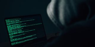 hacker behind a computer PCP@Kenya