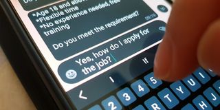 A person sending a message to apply for a job