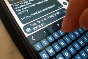 A person sending a message to apply for a job