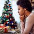 woman thinking of something while spending Christmas alone 