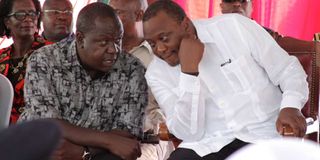 Former Interior Cabinet Secretary Fred Matiang'i and ex-President Uhuru Kenyatta.