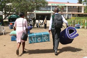 A Grade 10 student arrives at Nakuru High Senior School 
