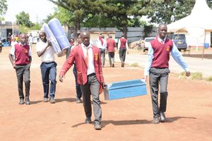 A Grade 10 student arrives at Nakuru High Senior School 