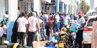 A Grade 10 student arrives at Nakuru High Senior School 