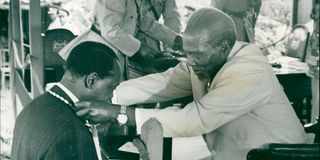Attorney-General Charles Njonjo and Jomo Kenyatta.