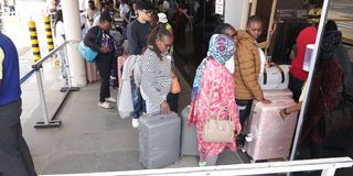 Travellers at the Moi International Airport in Mombasa