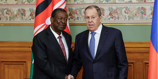 Russian Foreign Minister Sergei Lavrov shakes hands with Kenyan Foreign Minister Musalia Mudavadi 