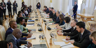 Russian Foreign Minister Sergei Lavrov shakes hands with Kenyan Foreign Minister Musalia Mudavadi 