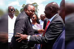 Uhuru Kenyatta and Gachagua shake hands