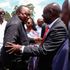 Uhuru Kenyatta and Gachagua shake hands